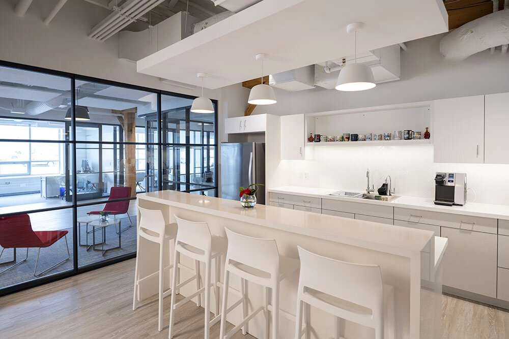 Kitchen area with natural lighting form the window in the background. © robert lowdon