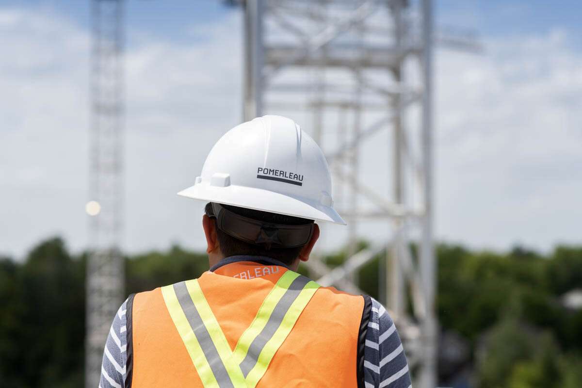 A construction supervisor over looks a work site. © robert lowdon
