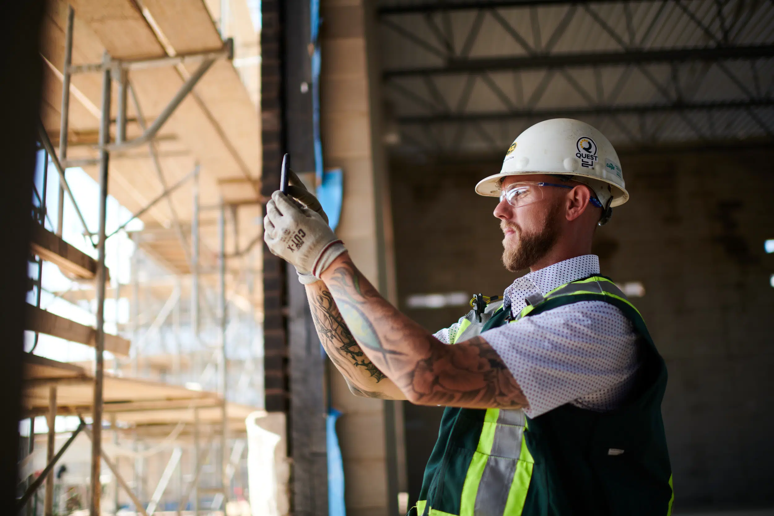 The construction site is a hive of activity, with workers busily putting up the new building. The progress photos are a great way to keep track of the progress, and also to see how the construction is coming along.