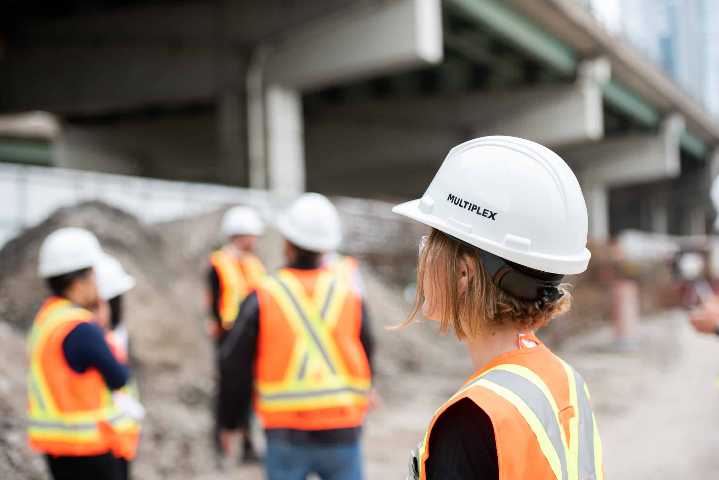 A loose team meeting on a construction site.