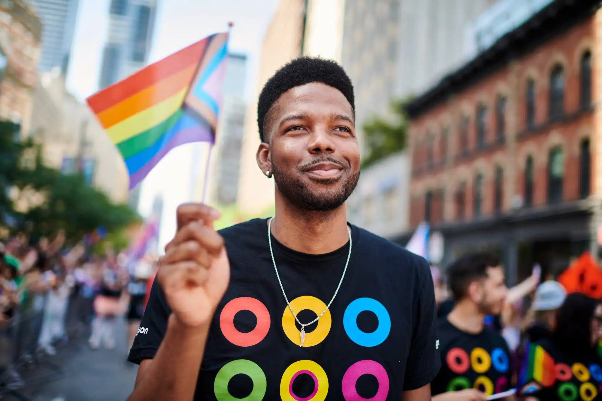 How Marketers Can Utilize Emotion-Evoking Images To Their Benefit - Dsc 6422 Copy Storytelling image of employee marching at pride parade.