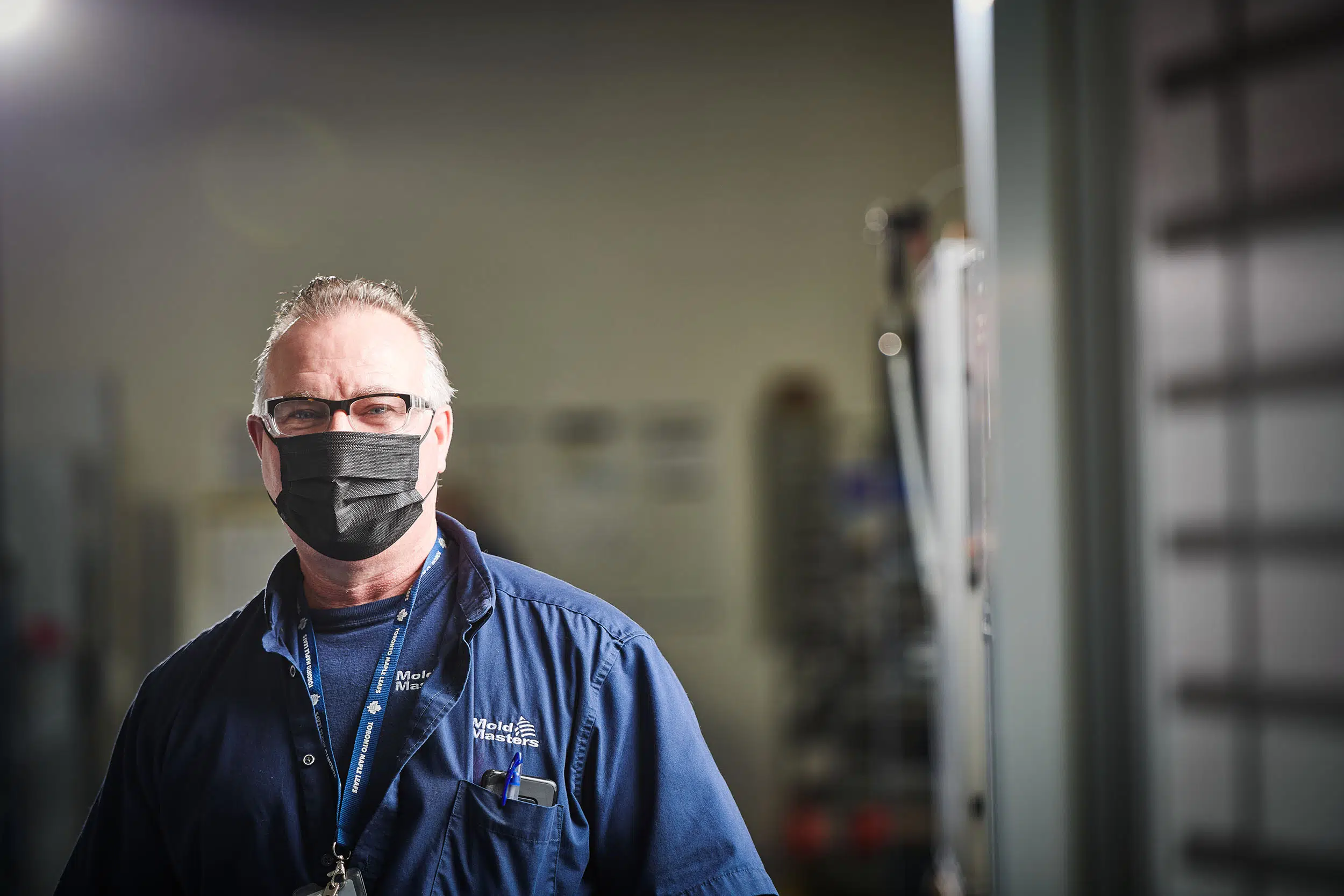 Portrait of a worker on the factory floor.