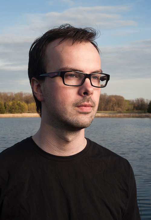 Headshot photographed outdoors with natural background