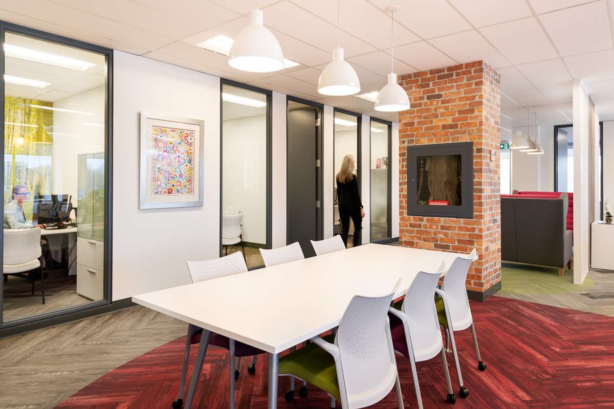 Modern touches create a comfortable work environment. © robert lowdon