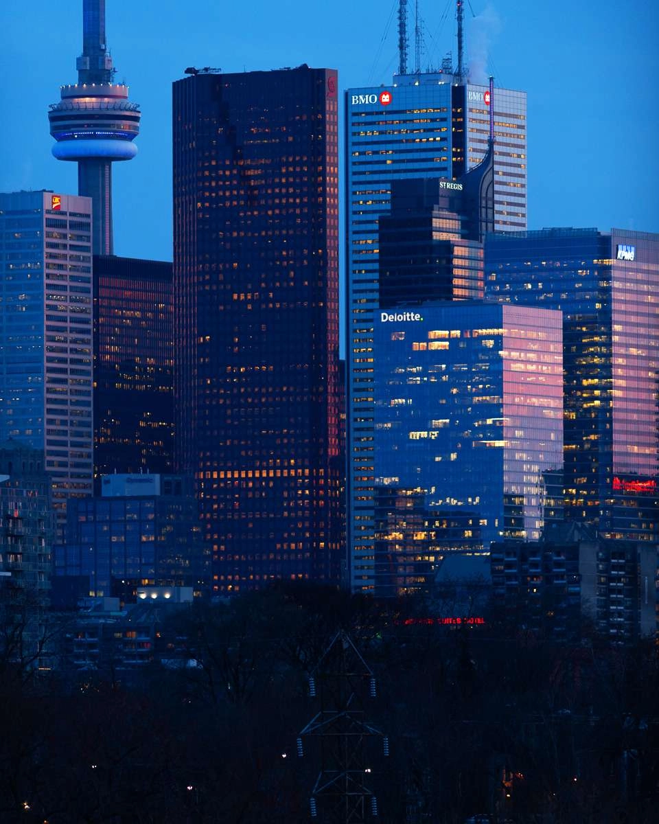 Twilight reaches the buildings of toronto. © robert lowdon